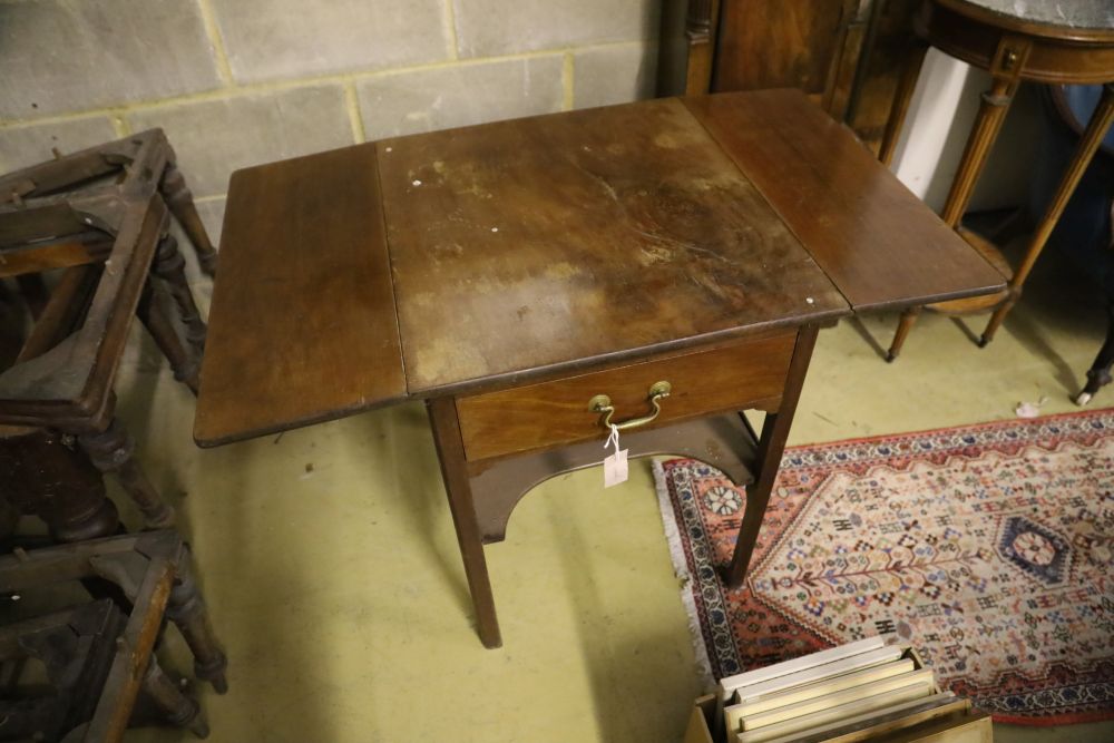 A George III mahogany drop flap two tier table, width 56cm, depth 61cm, height 71cm